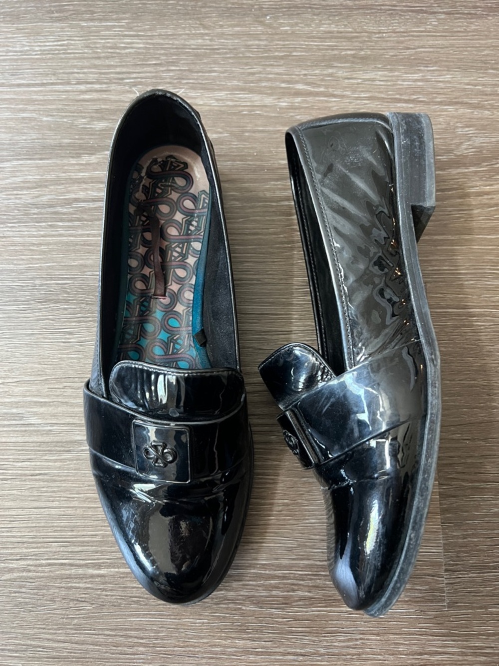 Patent Black Slip-On Loafers with Subtle Logo Accent